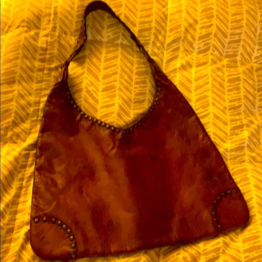 Dark reddish vintage leather purse with studs